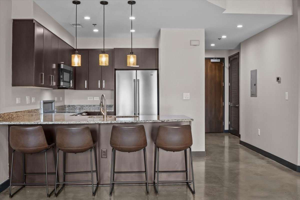 The kitchen is open to the living room area.