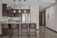 The kitchen is open to the living room area.