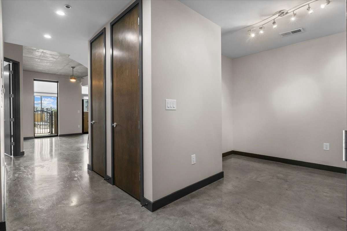 Just off the entry to the unit is a space for an office or additional space for guests.