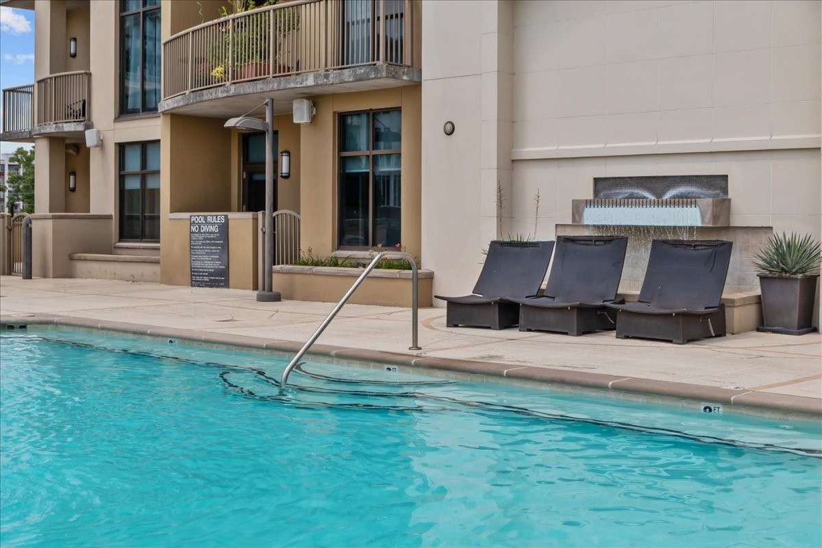Unit back door showing proximity to the pool and hot tub.