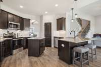 Example photos, home is under construction. Colors, materials, and finishes may vary.