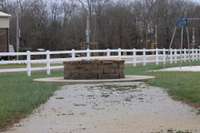 Community area, 2 pavilions, basketball court, swing set, large area for parking!