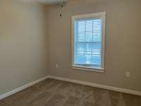 Carpeted bedroom with generous closet and a window for light. Carpet in the bedroom, no cold floors at night!