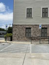 Handicapped parking by the back entrance to the building.