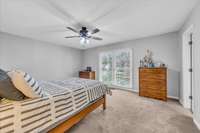 Primary Suite with two closets and renovated bath.