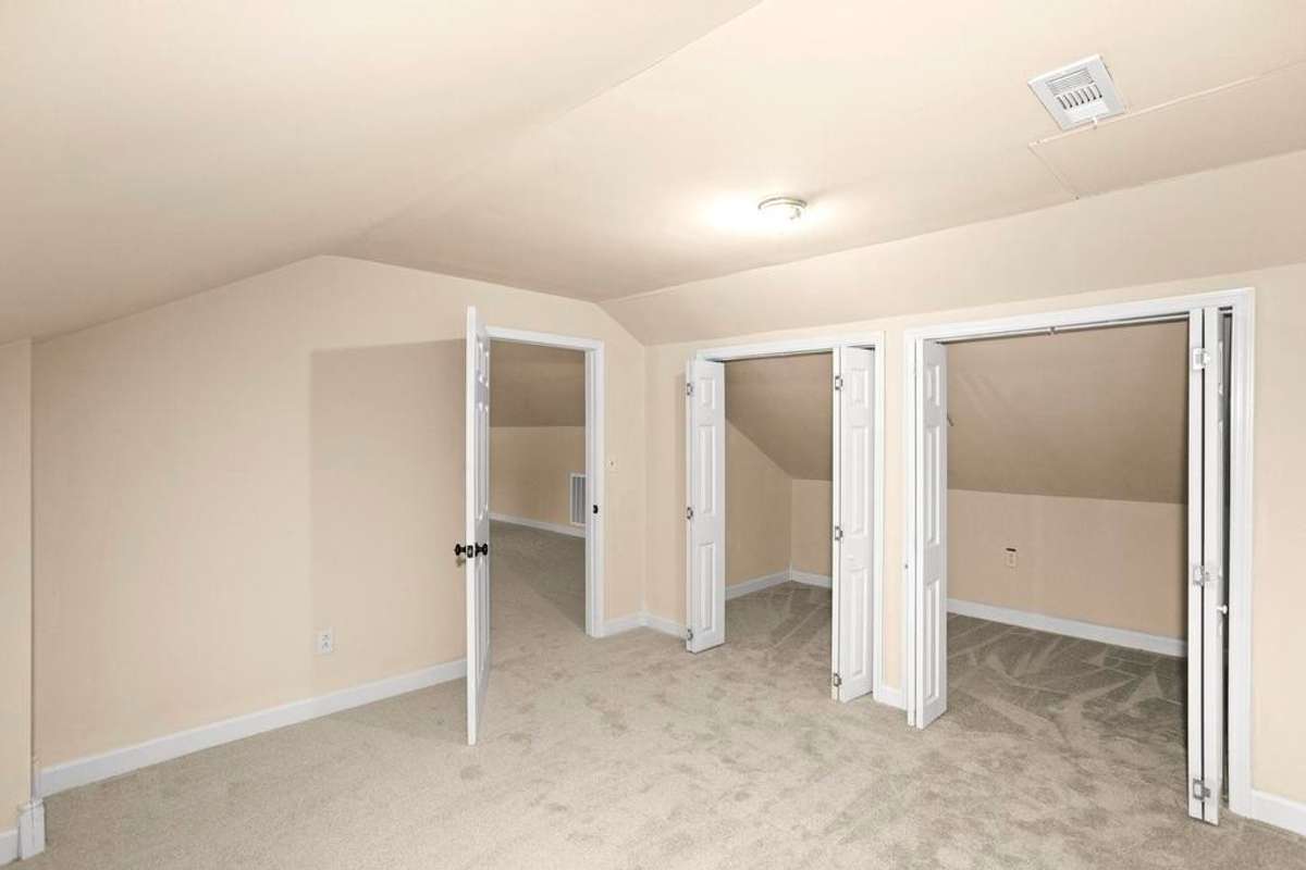 Large bonus room with extra storage upstairs.