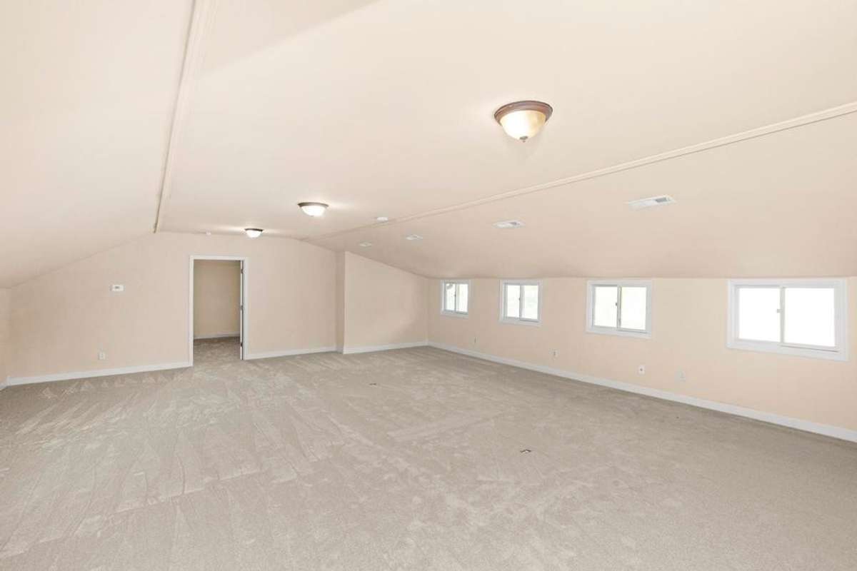 Large bonus room located on second level.