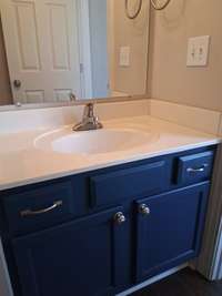 The Jack and Jill bathroom features a lovely window that fills the space with natural light. The tub/shower combination is perfectly shared between one of the upstairs bedrooms and hall.