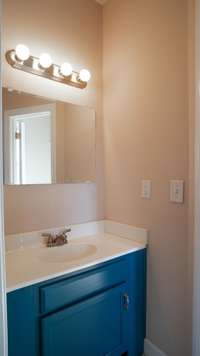 Vanity/ensuite vanity off one of two oversized bedrooms.