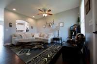 The arched detail adds a touch of architectural charm while maintaining a pleasing sense of flow. Perfect for entertaining or enjoying everyday connection throughout the spaces.