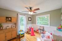 Flex room off of the kitchen could be an office, a large pantry, toy room, or hobby room.