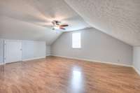 Media room above garage area