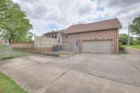Large driveway with plenty of parking spaces