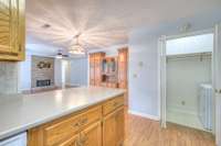 Washer and dryer off kitchen - remain with home