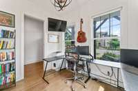 A work-from-home dream, this light-filled flex space can easily serve as a bedroom or a stylish home office.