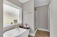 Bring the bubbles for a long, relaxing soak in this free-standing bath.