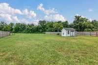 Do you want your own She Shed/He Shed? Look no further! 
If you're into floating around in a pool, the electricity is already installed!  
The yard is partially fenced, and the property goes beyond the chain-link.