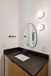 Main floor powder room - one of two