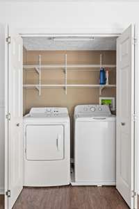 Utility closet off of dining area-washer/dryer remain