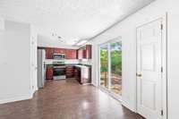 Kitchen-note the sliding glass door to the patio
