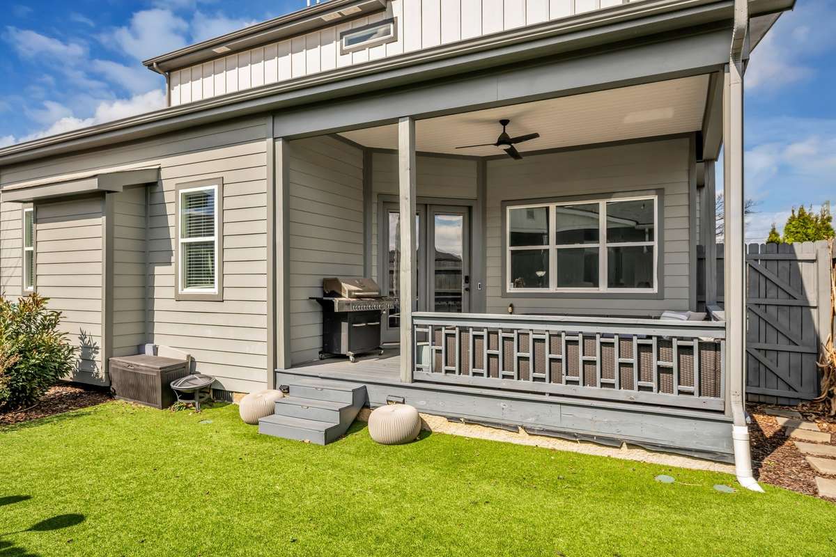 Turfed backyard for low maintenance living and year-round green.