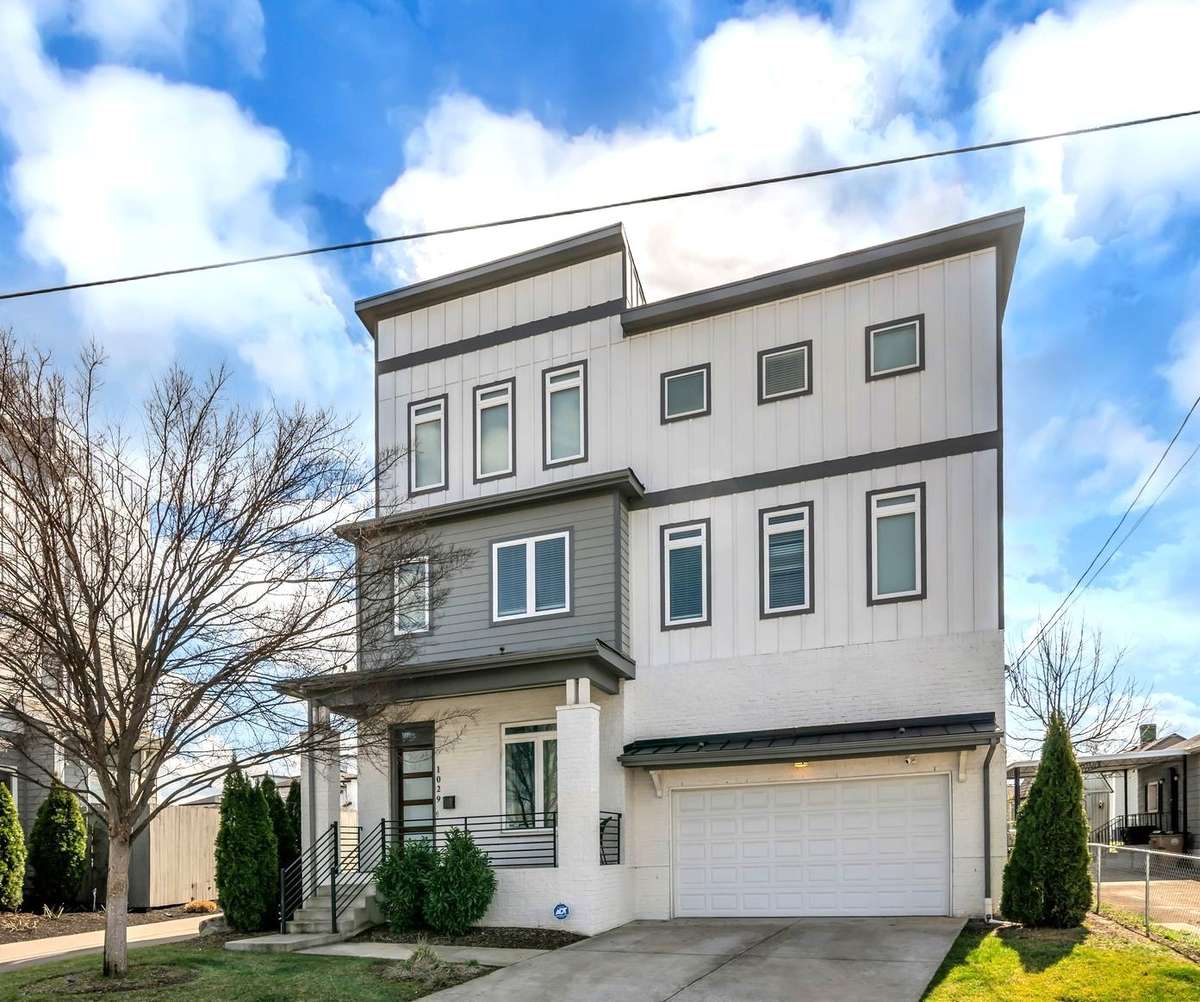 Eye-catching contemporary design with neighboring homes of the same aesthetic in this not-so-secret pocket of convenience just inside the I-65/I-40 loop and just blocks from Germantown for a fraction of the price.