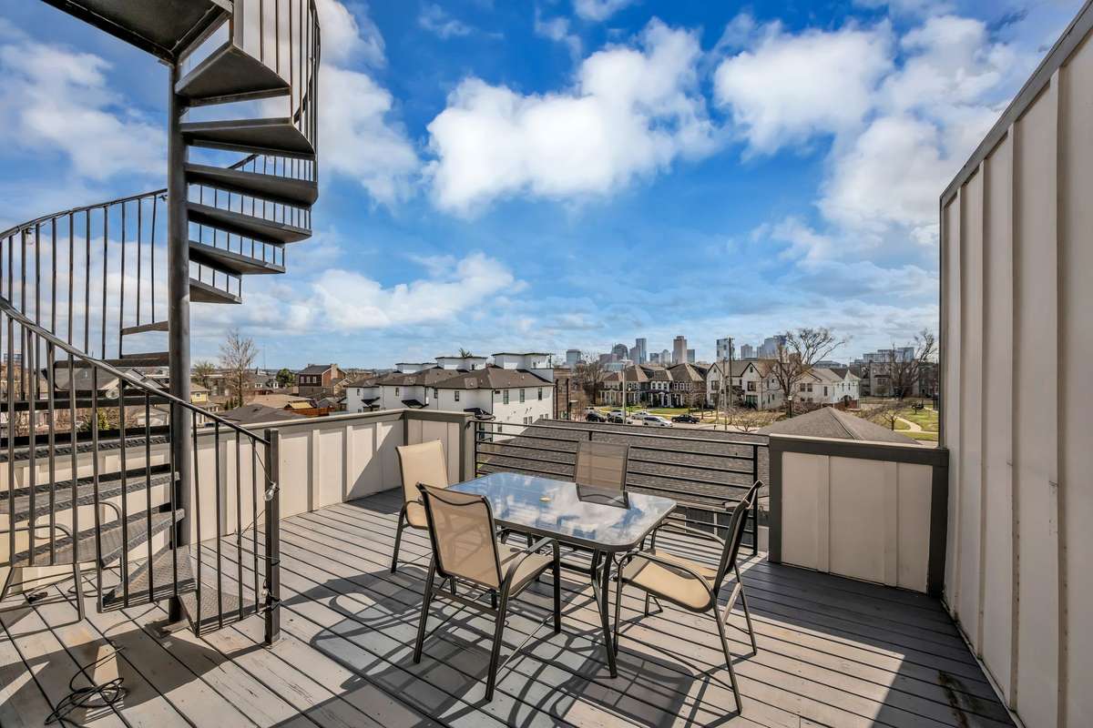 How often will you find not one but TWO rooftop decks with unobstructed downtown views?  Walk up the spiral staircase to get your 360 degree view!