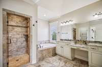 You'll feel like royalty in this fabulous Primary Bathroom! Jetted tub, walk-in shower & double vanity even with a place to sit and do your hair or makeup in comfort!