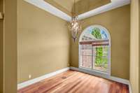 Large dining room with beautiful ceiling.