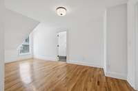 This is the 20x9 flex bonus area on the second floor.  This photo does not have virtual staging.  This area can be used as a home gym, craft area, homework zone, or entertainment/tv room.