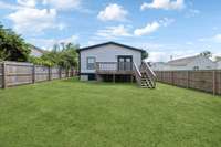 Your back yard is enveloped by a tall privacy fence, allowing you to create the perfect private outdoor oasis.