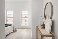 Primary bedroom faces front of the condo on the 3rd floor