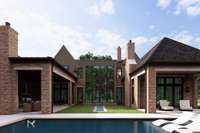 The outdoor reflection pool enhances the backyard’s appeal, creating a serene focal point visible from the keeping room.