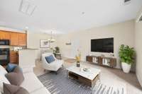 This picture depicts the living and dining rooms, virtually staged.