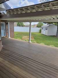 Three pergolas installed by current owner.  One over back deck. One at driveway entrance.  One over garage area.