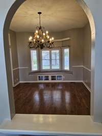 Front entry foyer view of den