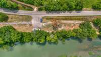 AERIAL Drone View
RIVERFRONT PROPERTY!!!
6.95 Acres+/- and Building that was Storefront for Heath's Canoe Rentals for 39 Years
