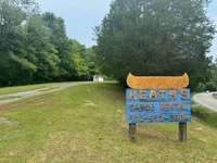 Heath's Canoe Rentals was a THRIVING business for many years... 
Riverfront Property being Sold by the Heirs
Located Approx. 1 Hour West of Nashville....
Approx. 5 Minutes from the interstate on - ramp at Waverly/Buffalo Exit 143