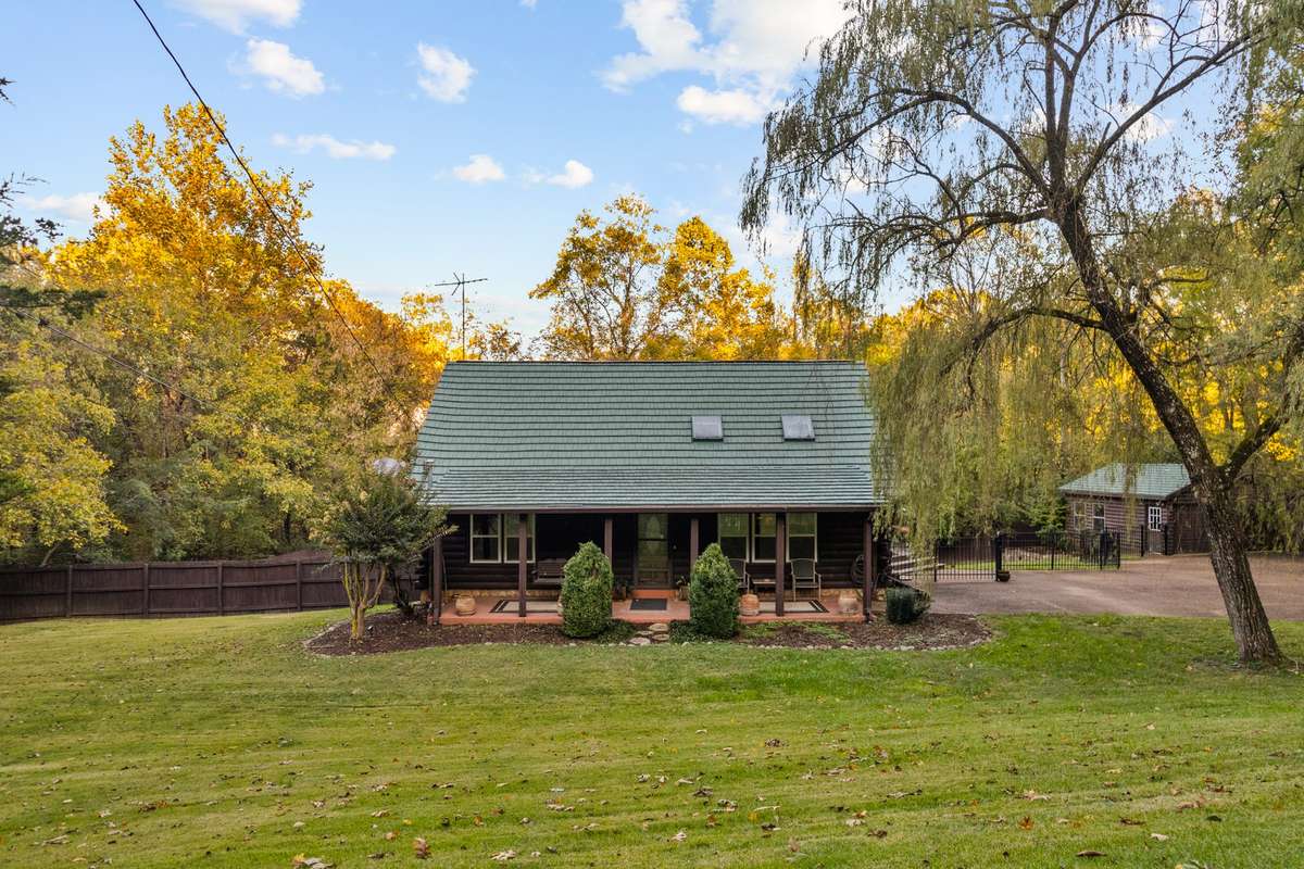 Enjoy a beautiful fall view of this extraordinary home!