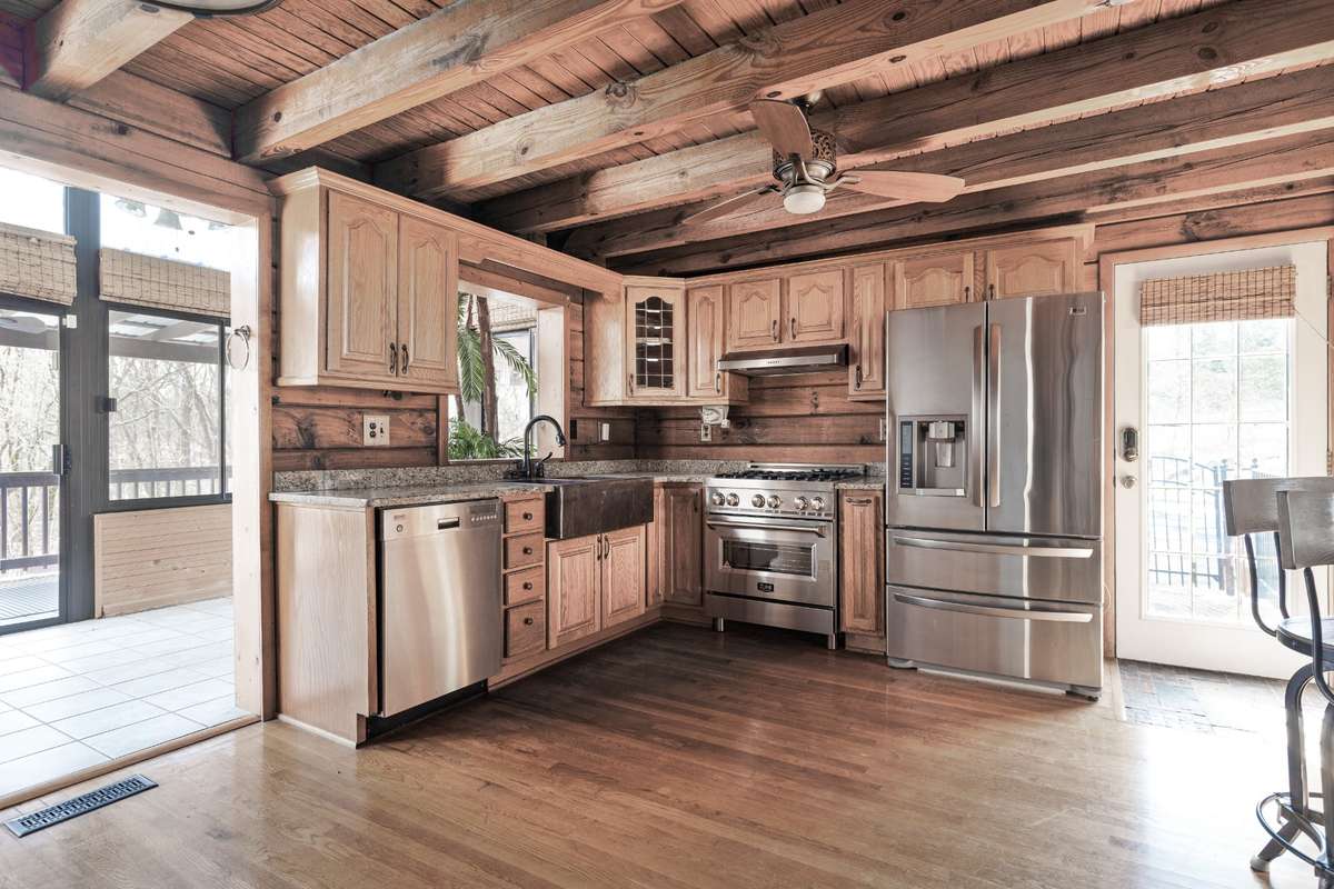 Top-quality stainless-steel appliances perfectly complement the open layout!