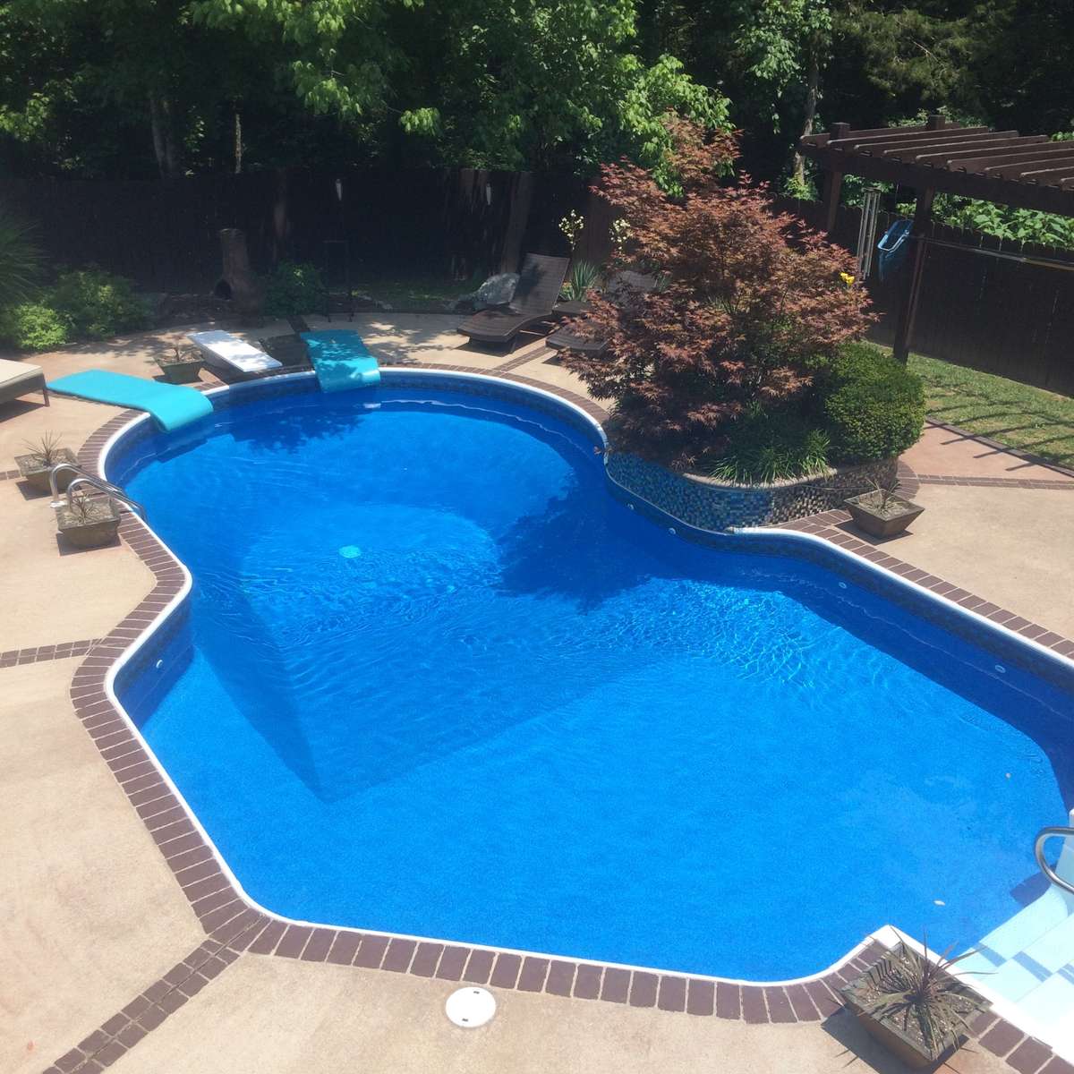 Another prior photo view of the stunning pool area — perfect for elegant entertaining and relaxing in style.