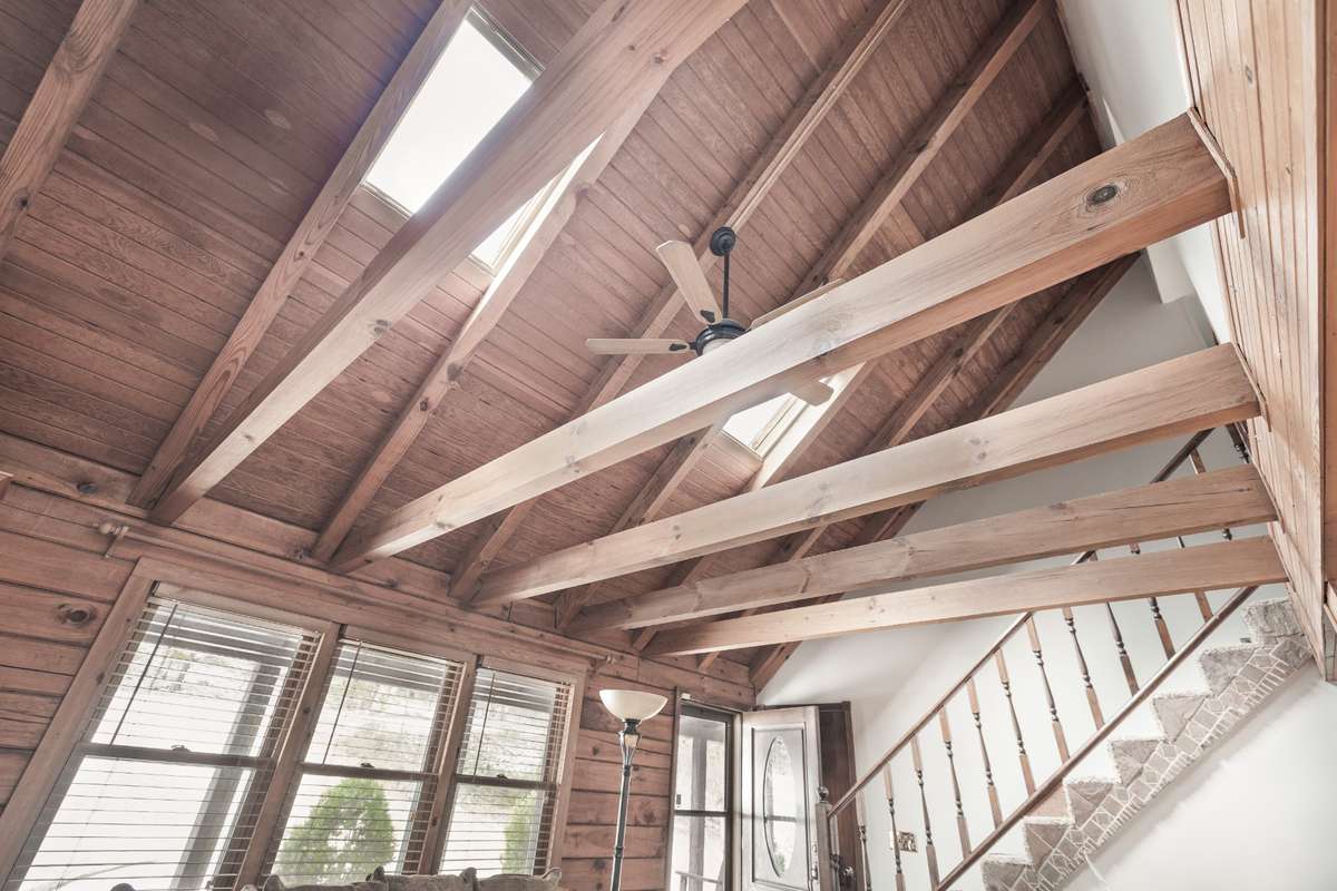 This home offers fresh paint—saving you time and money. Check out this view of the gorgeous, vaulted wood ceilings with skylights.