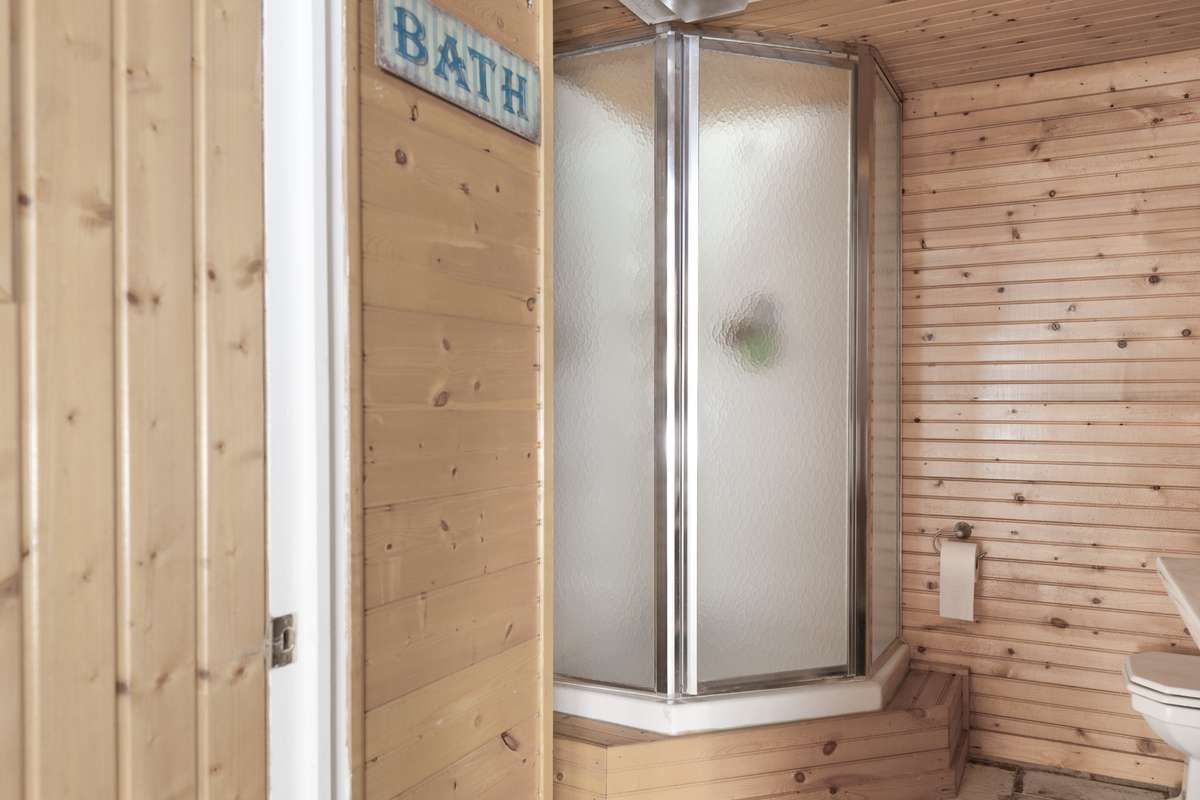 A closer look inside full Bath 3. Perfect for post-workout, pool, or hot tub use, or a quick rinse after the sauna.
