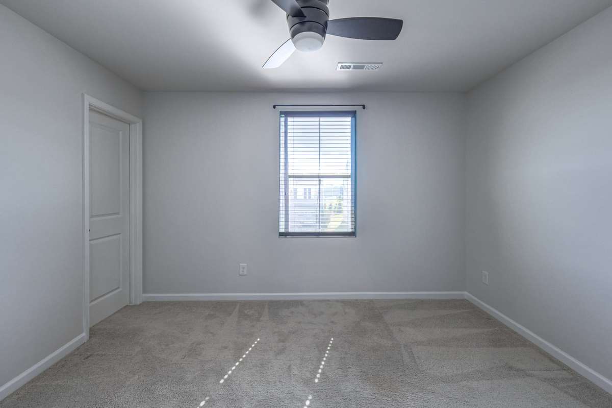 A third bedroom with a walk-in closet.