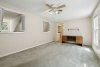 Pass through Loft has cut out “windows” looking down to the front entry room. Hinged Shutters can be closed for privacy