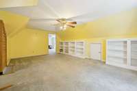 Oversized Bedroom with Built-in Shelving is great for a combination of uses.  Could be used as a large Bonus room if bedroom is not needed.