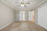 Ceiling fan with lighting in the master with neutral paint colors