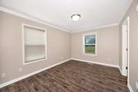 Bedroom- tile flooring, crown molding