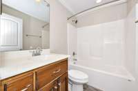 Full Bath- tile flooring, tub/shower combo