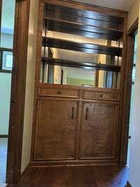 Built in curio cabinet with storage underneath.  This is an eye-catcher to enhance your hallway.